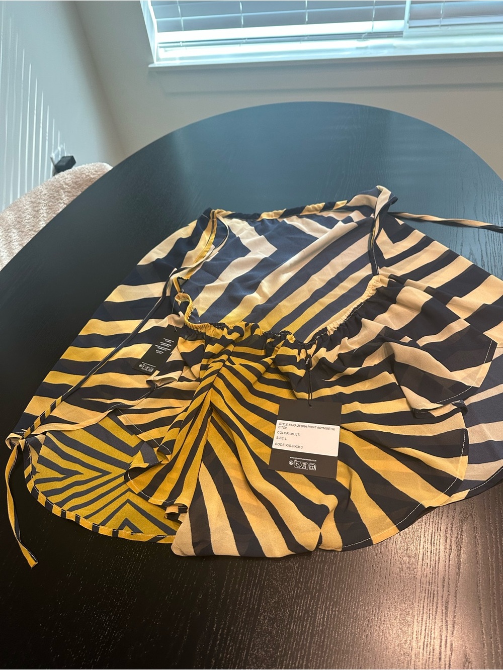 Noughts and Kisses Asymmetrical zebra print top